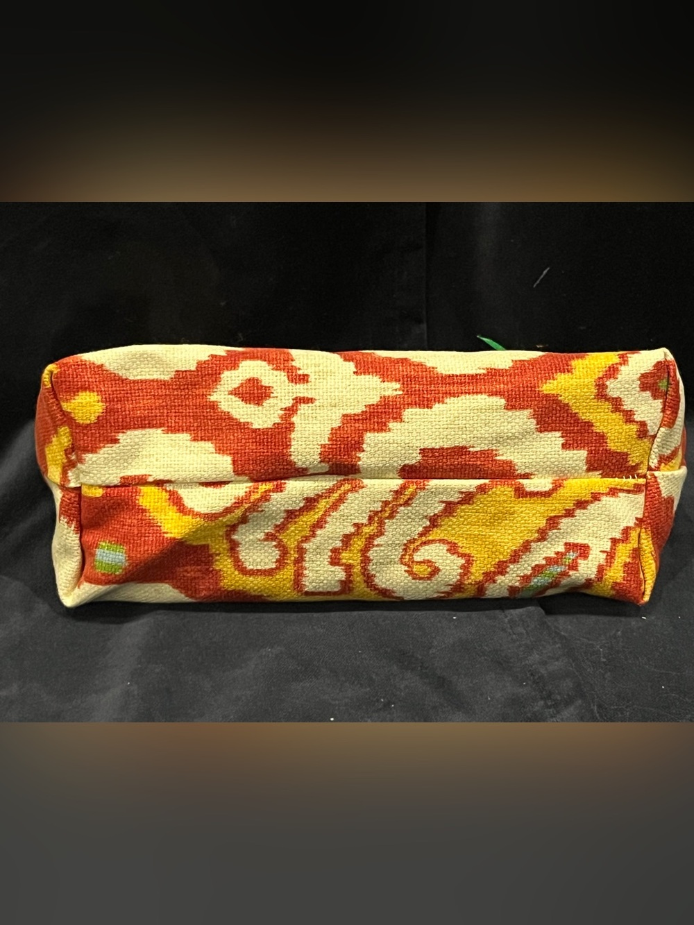 Red and Yellow Patterned accessory bag.